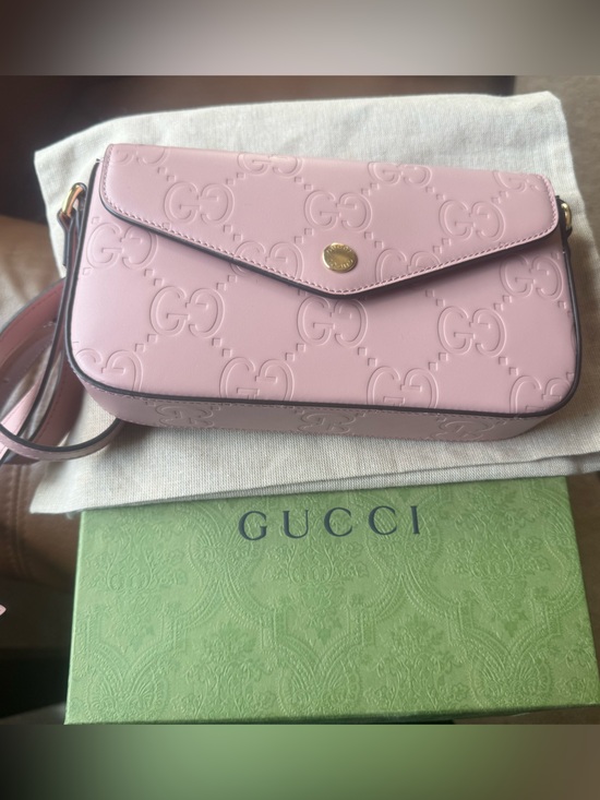 Gucci Handbags - Gucci Pink Embossed GG Leather Crossbody Bag